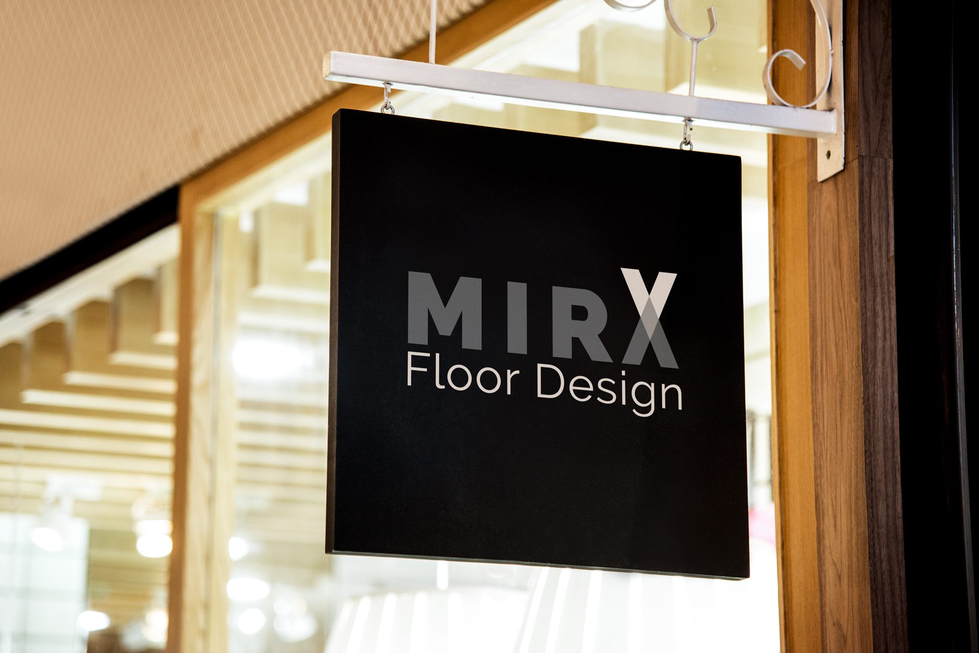 Logo von Webboxes für MiraX Floordesign auf einem Schild